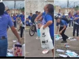 Alunos rasgam livros no meio da rua em Cuiabá e vídeo viraliza; assista